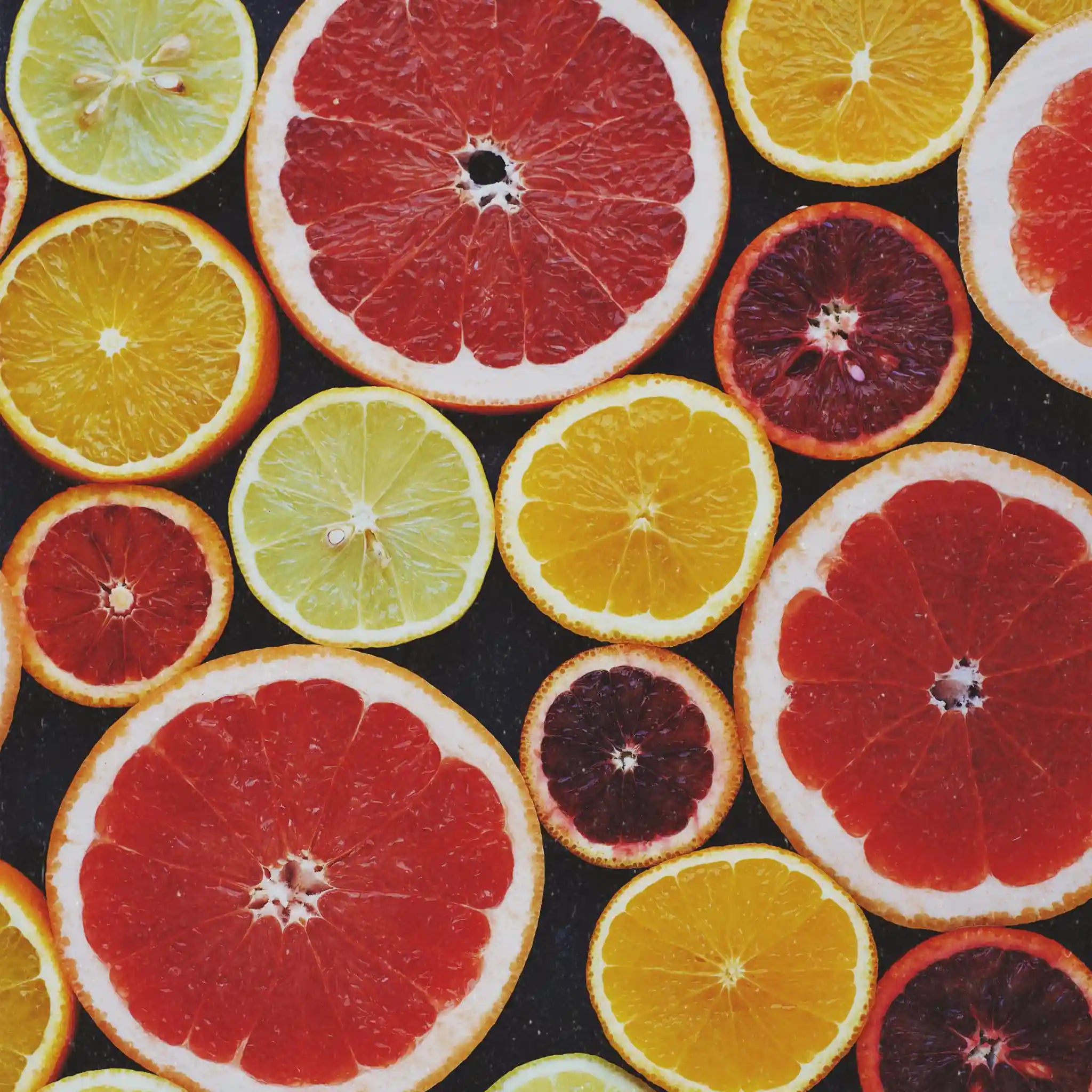 Rodajas de naranjas, mandarinas y bergamota